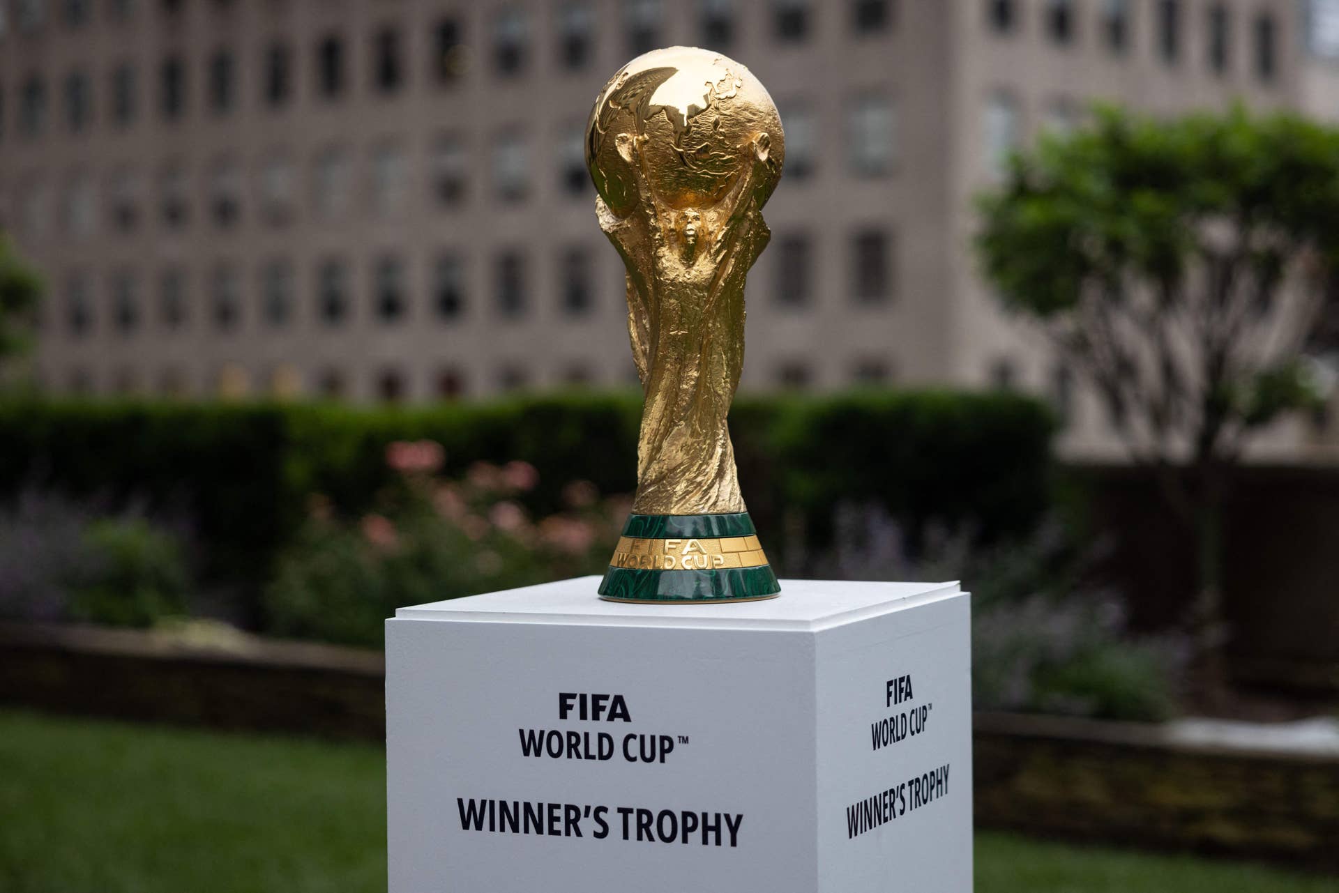 The FIFA World Cup trophy is displayed during an event in New York after an announcement related to the staging of the FIFA World Cup 2026, on June 16, 2022. - Mexico City's iconic Azteca Stadium and the Los Angeles Rams' multi-billion-dollar SoFi Stadium were among 16 venues named on June 16 to stage games at the 2026 World Cup being held in the United States, Canada and Mexico. (Photo by Yuki IWAMURA / AFP) (Photo by YUKI IWAMURA/AFP via Getty Images)