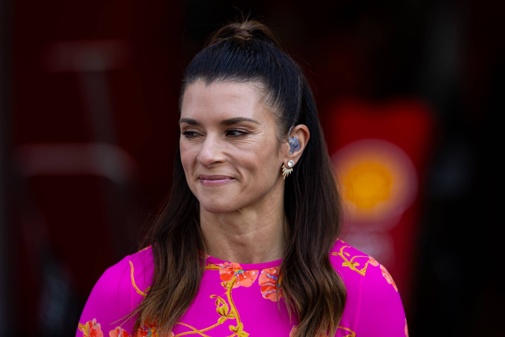 danika patrick green dress Danica Patrick in a turquoise weetheart dress with silver platforms heels