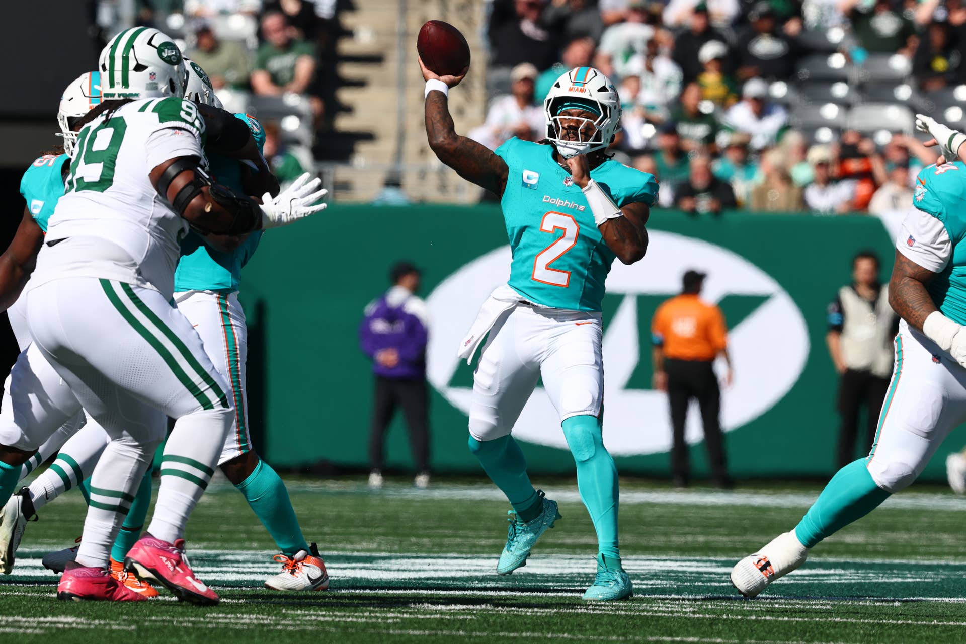 Miami Dolphins quarterback Malik Willis throws a pass
