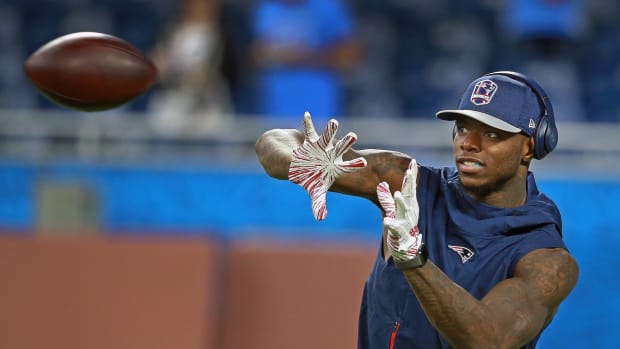 Josh Gordon catches a pass ahead of New England Patriots Vs Detroit Lions At Ford Field