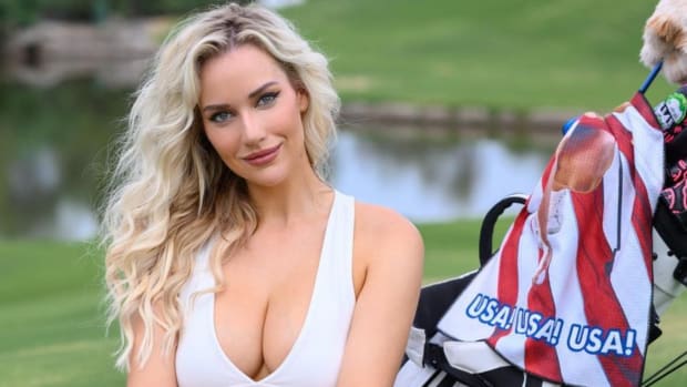 Paige Spiranac and her golf bag.
