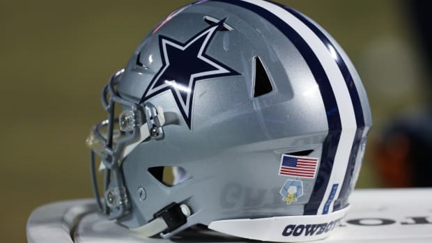 Dallas Cowboys helmet on the field.