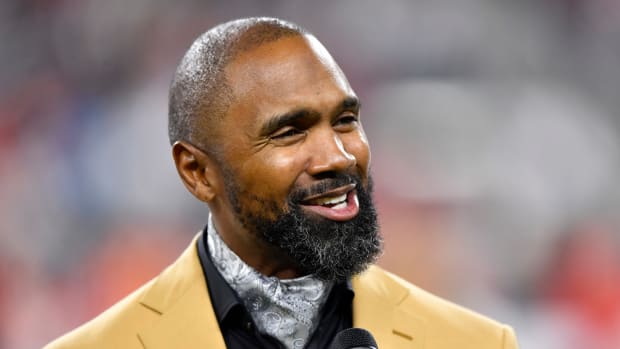NFL Hall of Famer and former Michigan star Charles Woodson smiling.