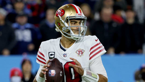 San Francisco 49ers quarterback Jimmy Garoppolo looks to throw the ball.