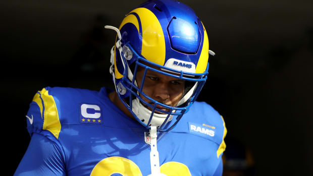 Los Angeles Rams defensive lineman Aaron Donald looks on.