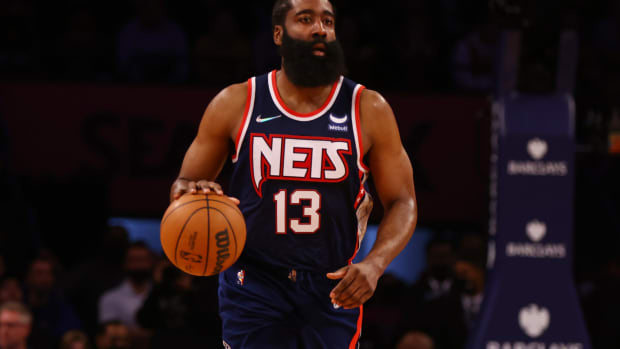 James Harden brings the ball up.
