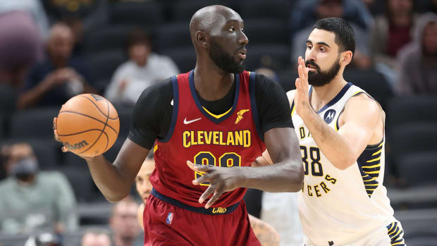 Cleveland Cavaliers center Tacko Fall holds the ball in the post.