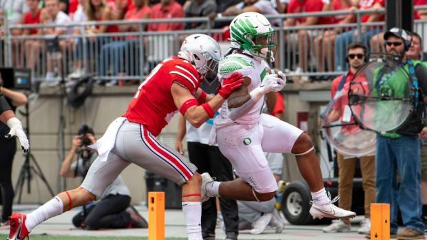 Oregon running back C.J. Verdell scores a touchdown against Ohio State.