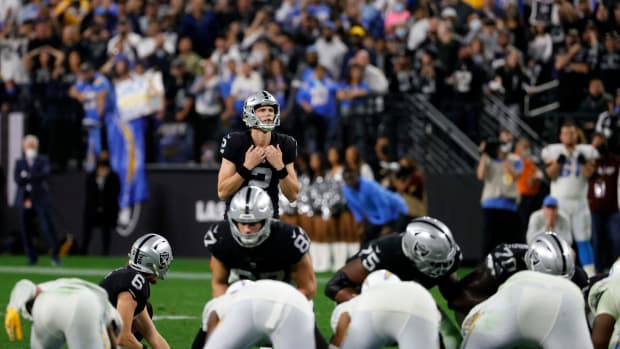 Las Vegas Raiders kicker Daniel Carlson lines up to kick a field goal.