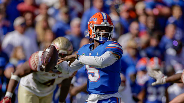 Emory Jones attempts a pass for Florida.