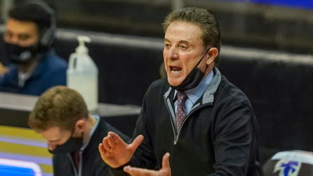 Iona head coach Rick Pitino on the sidelines during a game.