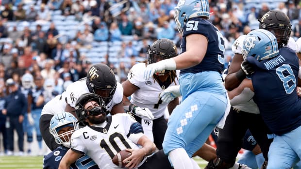 Wake Forest QB Sam Hartman sacked by North Carolina in a game between ACC schools.
