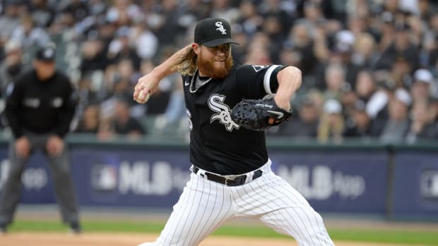 White Sox pitcher Craig Kimbrel delivers a pitch in a game.