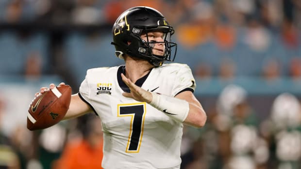 Appalachian State quarterback Chase Brice throws a pass against Miami.