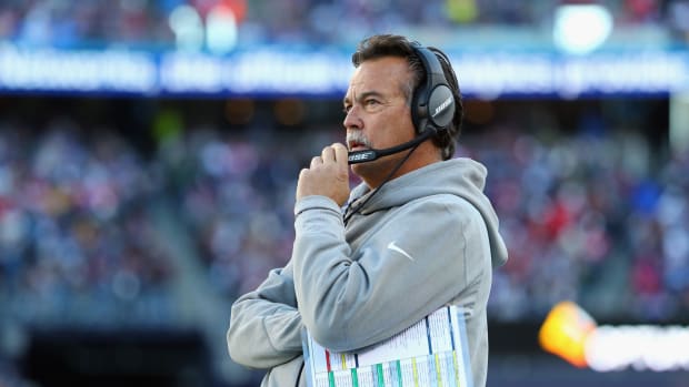 Jeff Fisher looking on as the Los Angeles Rams head coach.