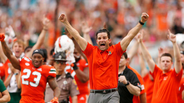 MIAMI, FLORIDA - OCTOBER 05:  Head coach Manny Diaz of the Miami Hurricanes reacts after a touchdown against the Virginia Tech Hokies during the first half at Hard Rock Stadium on October 05, 2019 in Miami, Florida. (Photo by Michael Reaves/Getty Images)