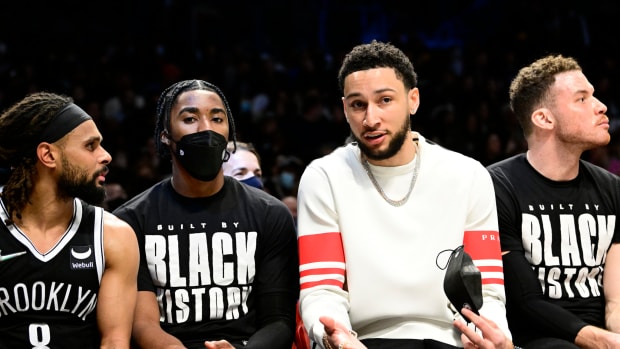 Brooklyn Nets point guard Ben Simmons on the bench.