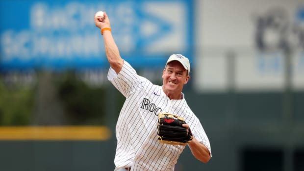 Peyton Manning throws out the first pitch.