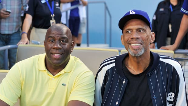 Magic Johnson And Kareem Abdul Jabbar Attend Los Angeles Dodgers Game.