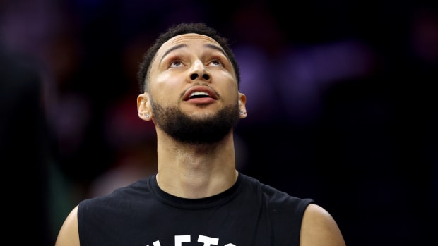 Ben Simmons looks on for the Nets.