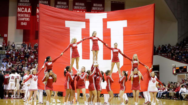 Indiana cheerleaders performing during a basketball game.