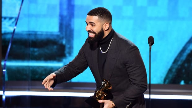 Drake accepting an award.