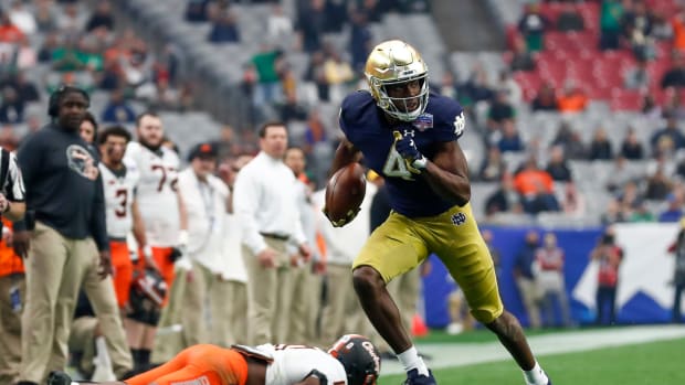 Kevin Austin Jr. of Notre Dame runs with the ball.