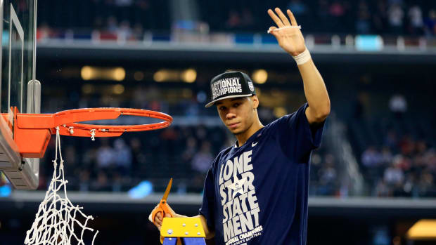 Shabazz Napier cutting down the net at the final four.