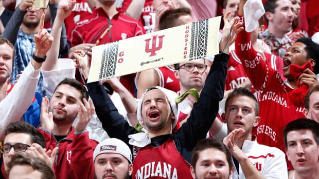Indiana Hoosiers fans cheering during a basketball game.