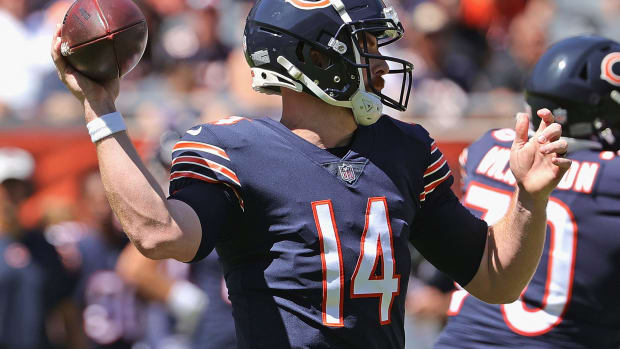 Andy Dalton throws a pass during the Bears' preseason game against the Dolphins.