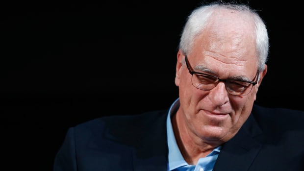 Longtime NBA head coach Phil Jackson speaking at an event.