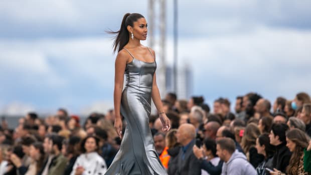 Leyna Bloom walks the runway as part of Paris Fashion Week.