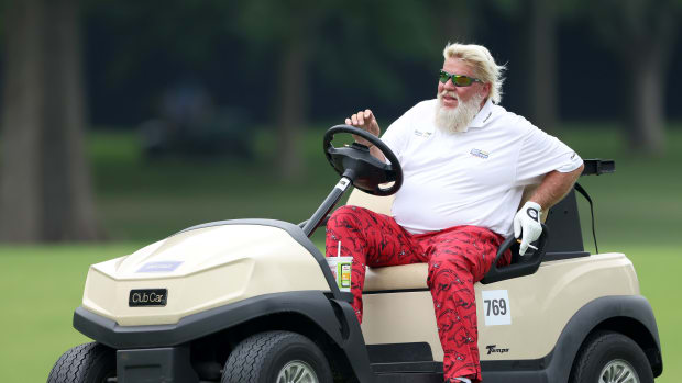 TULSA, OKLAHOMA - MAY 20: John Daly of the United States drives his cart to the 17th hole during the second round of the 2022 PGA Championship at Southern Hills Country Club on May 20, 2022 in Tulsa, Oklahoma. (Photo by Christian Petersen/Getty Images)