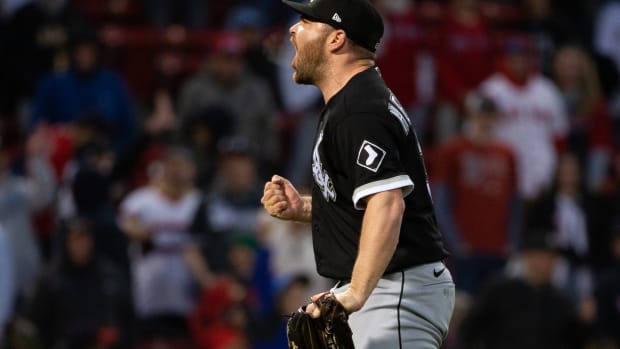 White Sox pitcher Liam Hendriks yells after closing out a game.