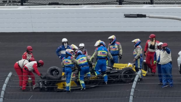 Colton Herta's car flips over during Indy 500 practice.