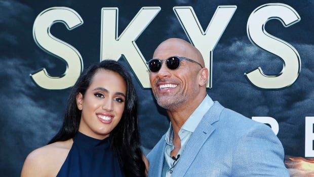Actor Dwayne Johnson and his daughter Simone Alexandra Johnson attend the premiere of 'Skyscraper' on July 10, 2018 in New York City. (Photo by KENA BETANCUR / AFP)        (Photo credit should read KENA BETANCUR/AFP via Getty Images)