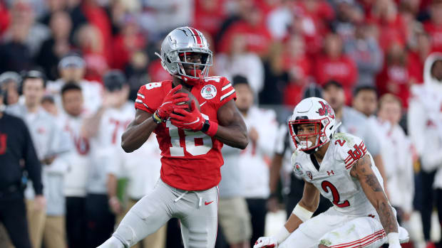 Ohio State wide receiver Marvin Harrison Jr. catches a pass against Utah in the Rose Bowl.