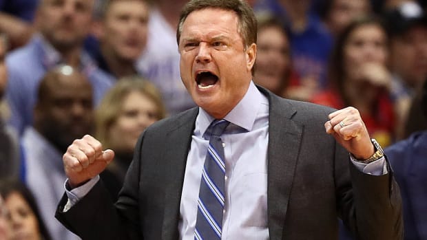 Bill Self celebrating during a game.