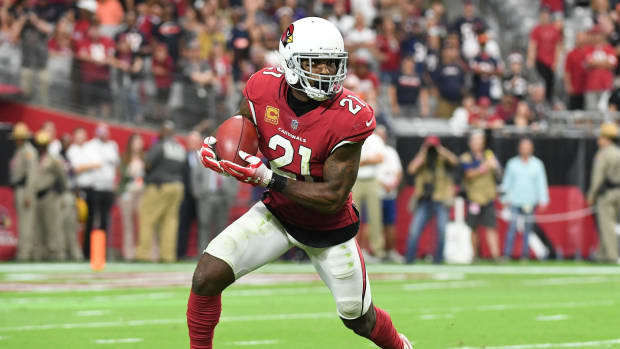 Patrick Peterson running with the ball.
