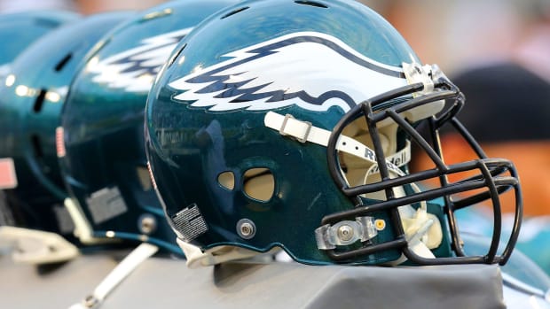 Eagles helmets on the sidelines.