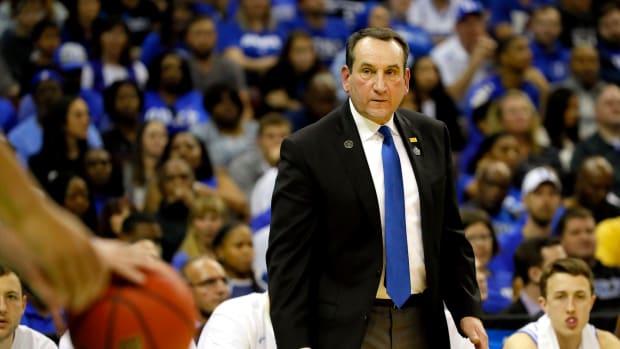 coach k looks onto the court during the game against ucf