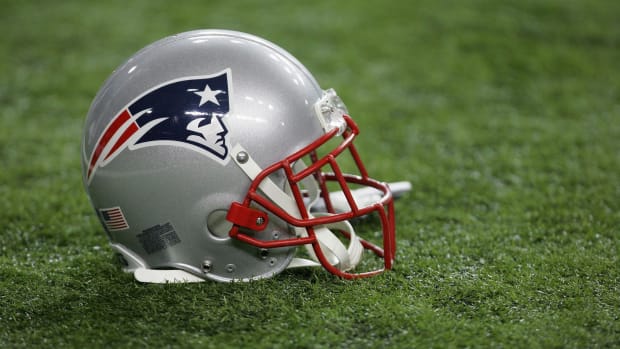 A closeup of a New England Patriots football helmet. The team will be without David Andrews in Week 3.