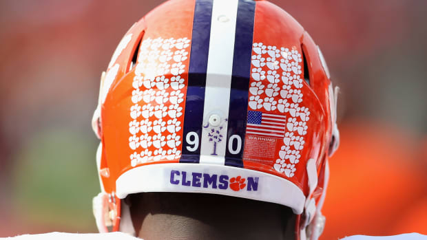 The back of a Clemson player's helmet.