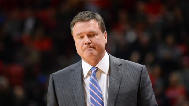 Kansas basketball head coach Bill Self looking distressed during a Jayhawks game.