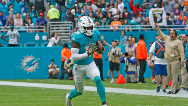 DeVante Parker runs with the ball for the Miami Dolphins.