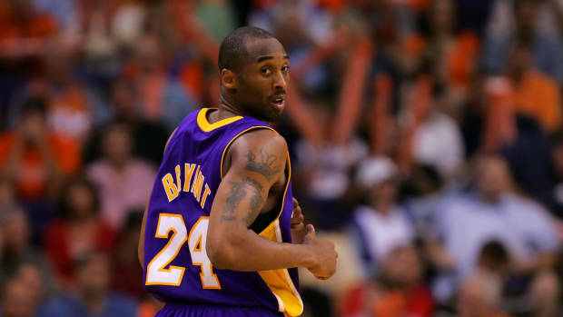 Kobe Bryant runs down the court during a Lakers game.