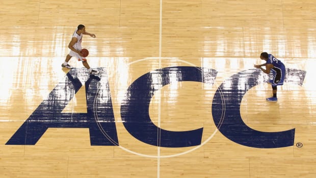 Malcolm Brogdon brings the ball up the floor during ACC Tournament.