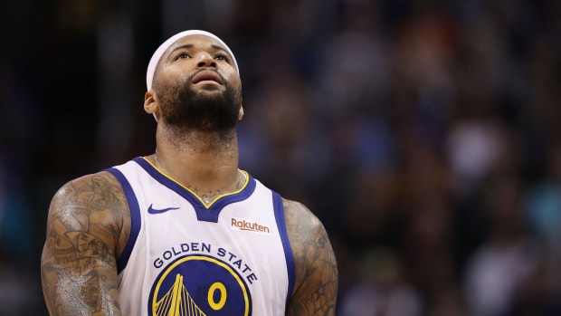 A closeup of DeMarcus Cousins looking up during a game.