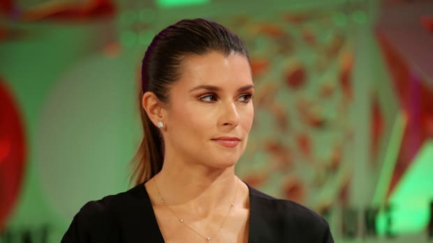 danica patrick speaks on stage at a fortune summit