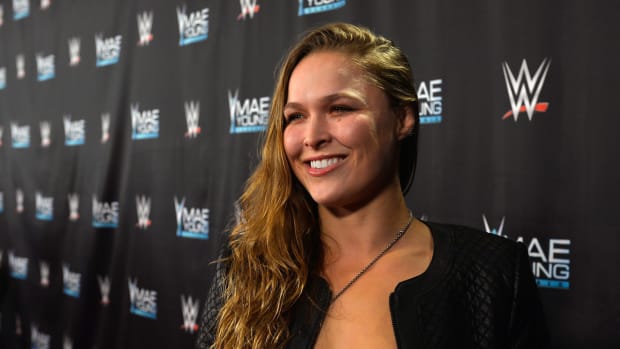 Ronda Rousey posing for a photo on the red carpet.